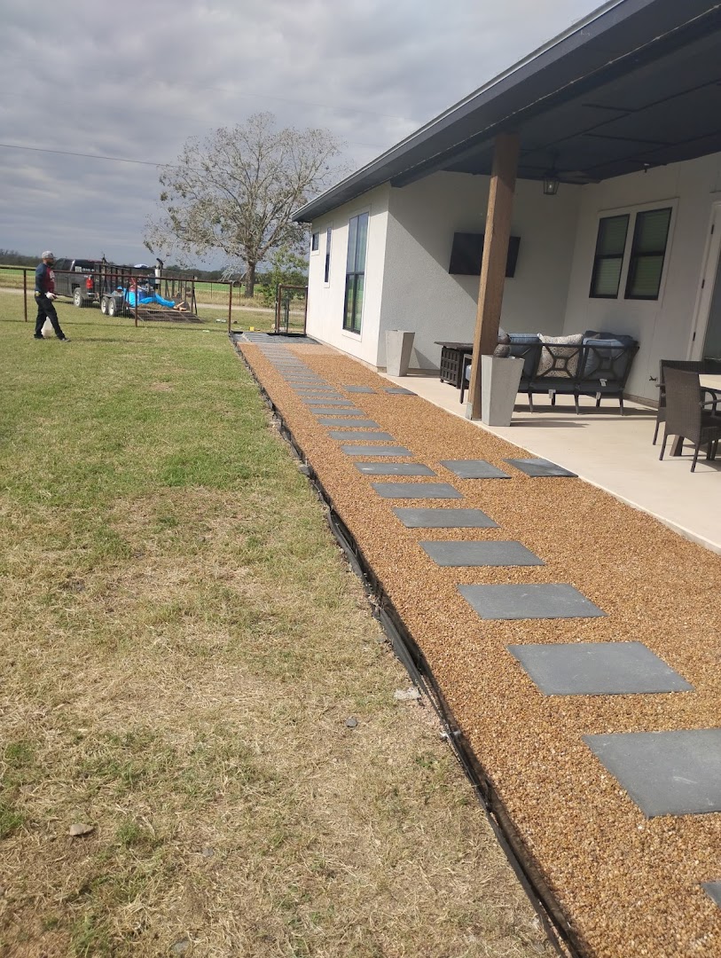 Stepping stone path set into a green lawn, Seguin TX